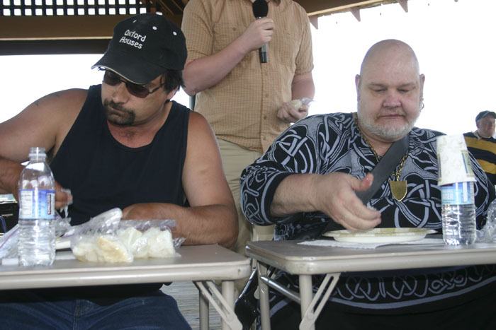 Eric Perkins of Kingston (left) is the lucky first place winner of the annual lutefisk eating contest at Viking Fest this year. Charles Jensen of Des Moines (right) came in second.