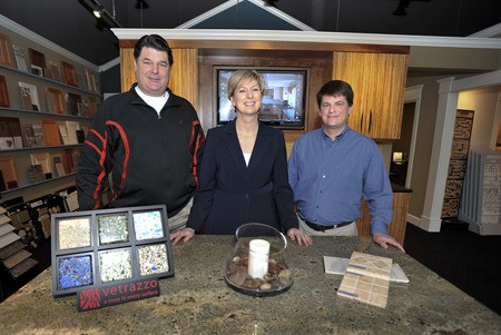 Kitsap Kitchen & Bath Co. recently opened a showroom on NE Forest Rock Lane. Pictured are  (left to right) owner James Collins