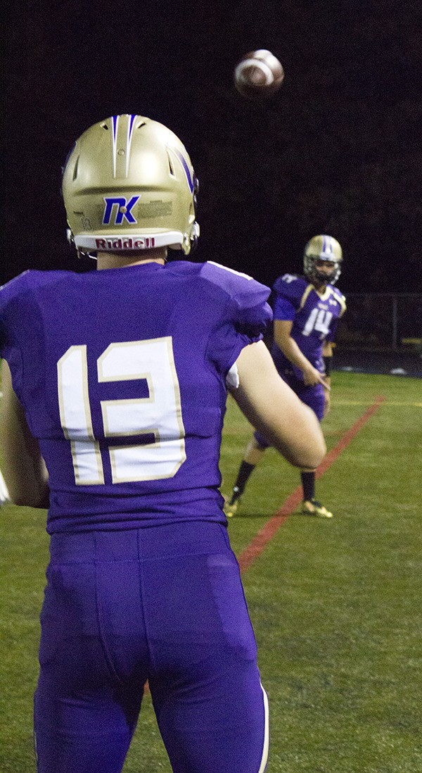 North Kitsap football players warm up during a home game in fall of 2015.