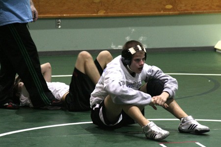 Eagles wrestler Connor Veach takes a breather during practice Tuesday. Klahowya Secondary School