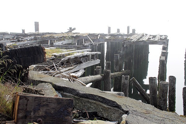 Pilings and overwater structures will be removed from the Port Gamble mill site shoreline beginning in July.
