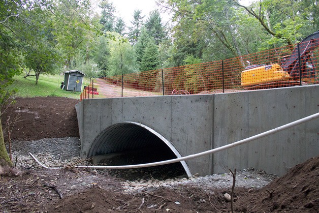 A new culvert and bridge is nearly completed off of Noll Road to accommodate Bjorgen Creek. The creek destroyed the former culvert in 2012.