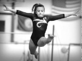 Nikki Hansen of the Olympic Gymnastic Center competed on beam during the club’s kickoff meet last week in Silverdale. Hansen is a Level 7 gymnast and one of 22 athletes on the team. The first USA Gymnastics-sanctioned competition of the season is in January. Following that event