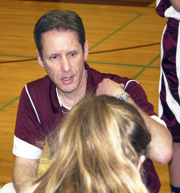 Mark Lutzenhiser guided South Kitsap High School’s girls basketball team to its first 20-win season in a decade in 2010-11.