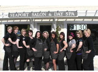 The staff of Seaport Salon & Day Spa pose outside the new building