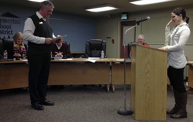 Aly Rotter is sworn in to the school board by Bremerton School District Superintendent Dr. Aaron Leavell.