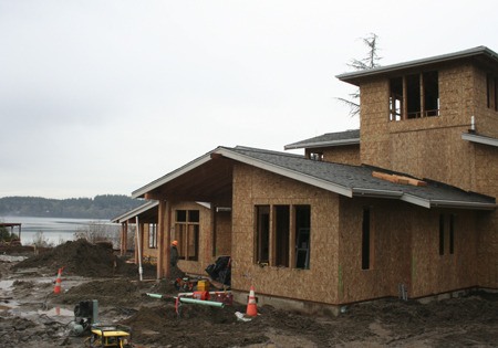 Builders continued work last week on Chico Beach Cottages