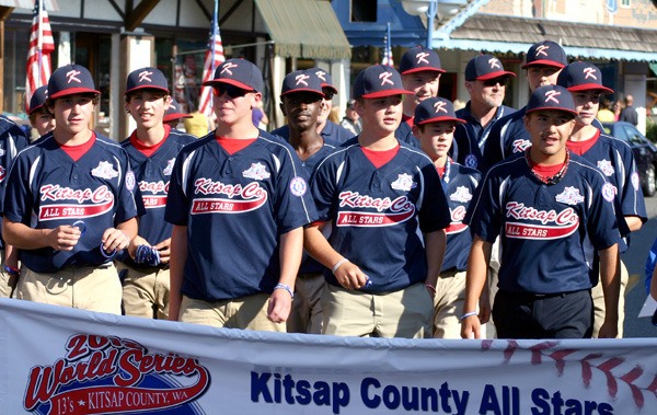 The Kitsap County All Stars are cheered during the 2012 Babe Ruth World Series Parade in downtown Poulsbo