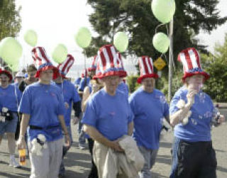 Life Care of Port Orchard employees and family members participate in a past Memory Walk.