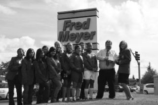 Members of SkillsUSA and the Bremerton girls soccer team were at the Fred Meyer in East Bremerton last week to accept a $10
