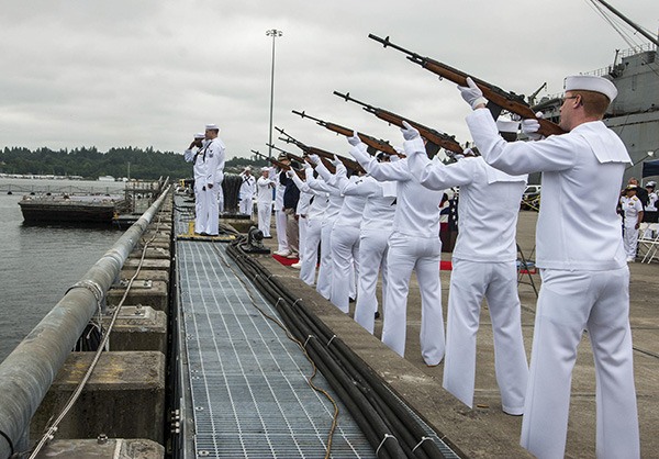 Sailors from Navy Region Northwest render honors during a gun salute at a ceremony commemorating the 72nd anniversary of the Battle of Midway held at Naval Base Kitsap on June 4.
