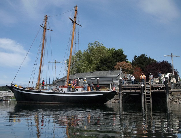 The schooner Fiddlers Dream ties up to the Port of Poulsbo tidal grid on May 22. A crane was expected to remove the schooner’s masts later that day. The masts are being replaced.
