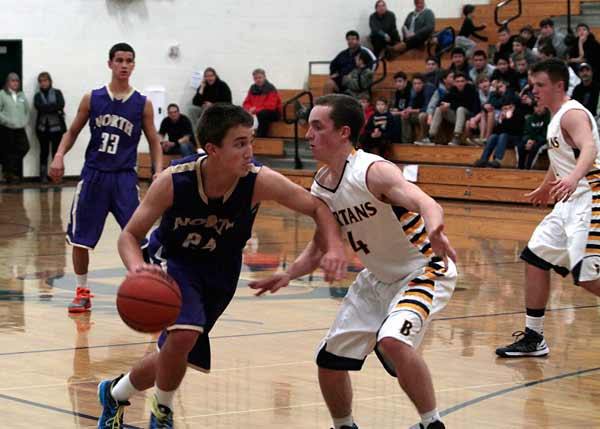 North Kitsap pushes its way down the court during the non-conference game against the Bainbridge Spartans Dec. 3.