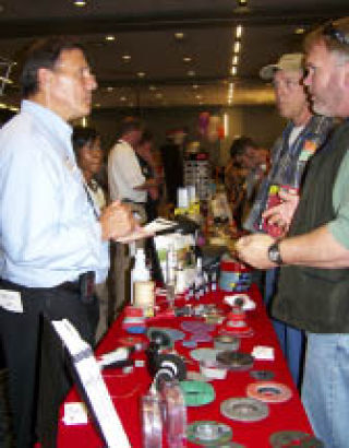 Attendees at last year’s West Sound Safety & Health Expo visit one of the many vendors present at the event.