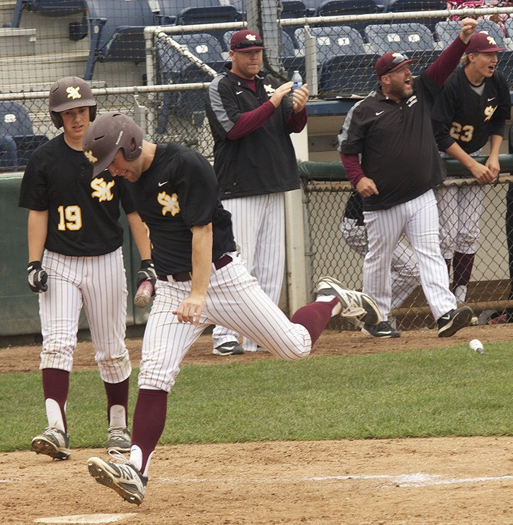 Cooper Canton was among several Wolves who scored runs during the first inning of the May 22 regional tournament at Everett Memorial. South Kitsap