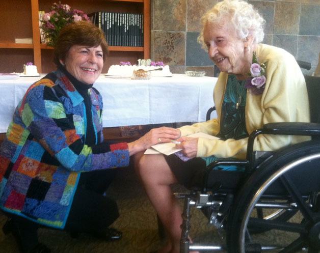 Bremerton Mayor Patty Lent congratulates June Bess on turning 100 last week.