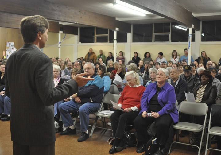 Bremerton City Councilmember Greg Wheeler listens to personal safety concerns at a large gathering of Union Hill Neighborhood residents Thursday.