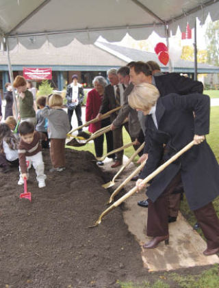 Children in Olympic College’s daycare program help staff and other local officials break ground on the college’s proposed Sophia Bremer Child Development Center Oct. 22.
