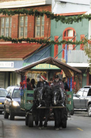 Downtown Poulsbo is dressed up for the holidays and will include horse drawn rides through the downtown core.