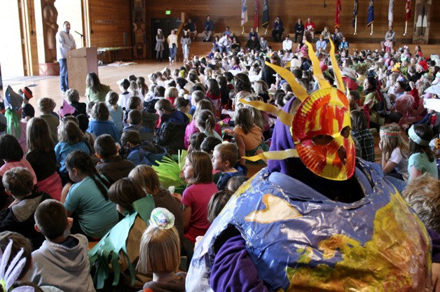 Suquamish Elementary students filled the House of Awakened Culture Friday in celebration of Earth Day.