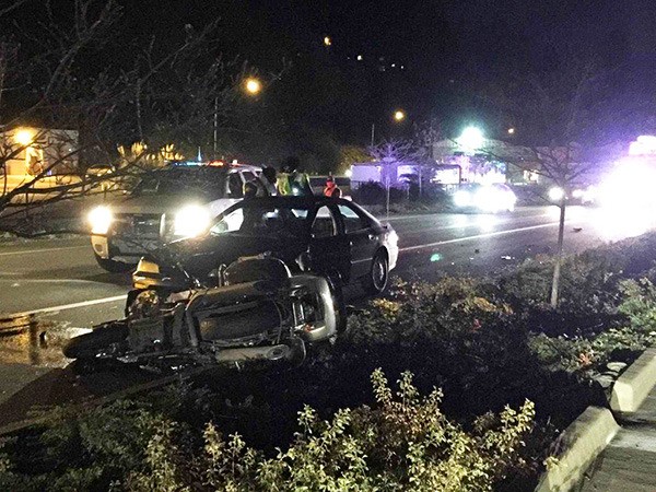 A Honda Accord and Kawasaki motorcycle at the scene of the crash on State Route 304 in Bremerton.