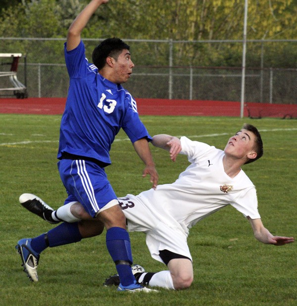 South Kitsap junior midfielder Justin Peterson was among several Wolves who applied pressure during Tuesday’s 2-0 season-ending loss against Stadium.