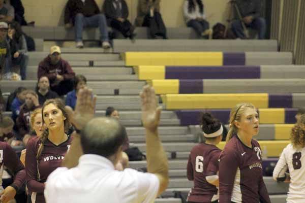 South Kitsap varsity volleyball players react to an out-of-bounds call against them during the match against North Kitsap Oct. 8 in the North Kitsap Gymnasium.
