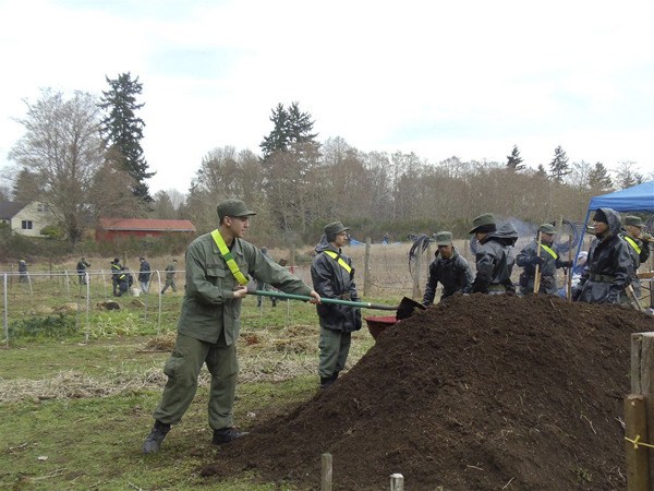 Cadets from the Washington Youth Academy in Bremerton spent a day helping out the Giving Garden volunteers