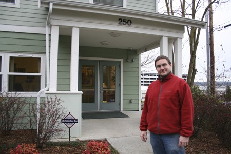 Director Mike Curry stands outside Benedict House last week. The men's homeless shelter in Bremerton fosters social interaction and continues to stay full to capacity.