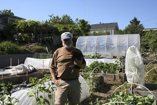 Eugene Brennan offers a tour of his garden which will be featured in the upcoming Manette Neighborhood Coalition’s inaugural Edible Garden and Tour de Coop.