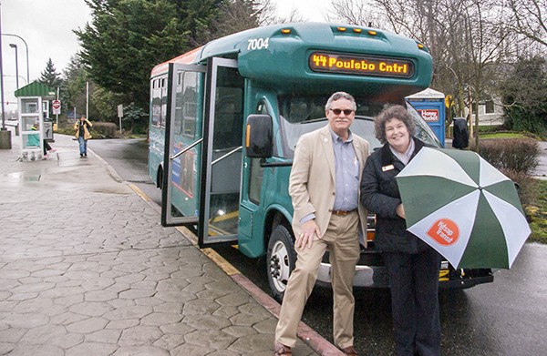 Poulsbo City Councilman Ed Stern and Mayor Becky Erickson get ready to take a ride on Kitsap Transit's Poulsbo bus