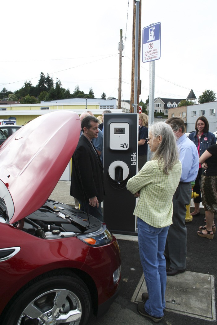 An electric car is ready to be plugged in to the new charging station unveiled Monday morning in Port Orchard.