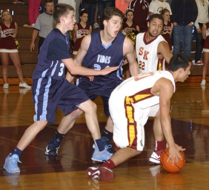 Nic Stoner steals the ball from a Gig Harbor player during the Wolves Jan. 16 win at home.