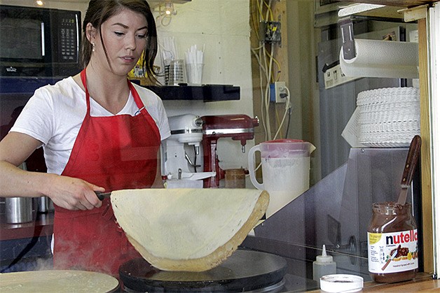 Kim Hissung makes crepes at J'Aime Les Crepes. Hissung is a longtime employee of the company