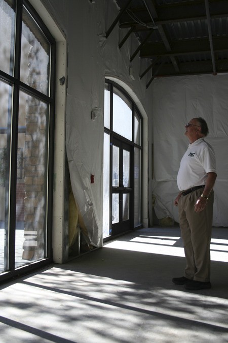 Developer Tim Ryan stands in his half-vacant building in downtown Bremerton. Although some developers and government officials have been saying for years Bremerton is on the verge of booming