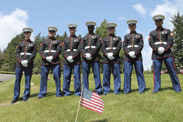 A group of Marines participate in an annual Memorial Day ceremony at the Forest Lawn Cemetery in Bremerton on Monday
