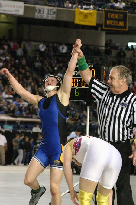 Bremerton High School senior Lauren Richardson celebrates after winning a second state title Feb. 19 at the Tacoma Dome.