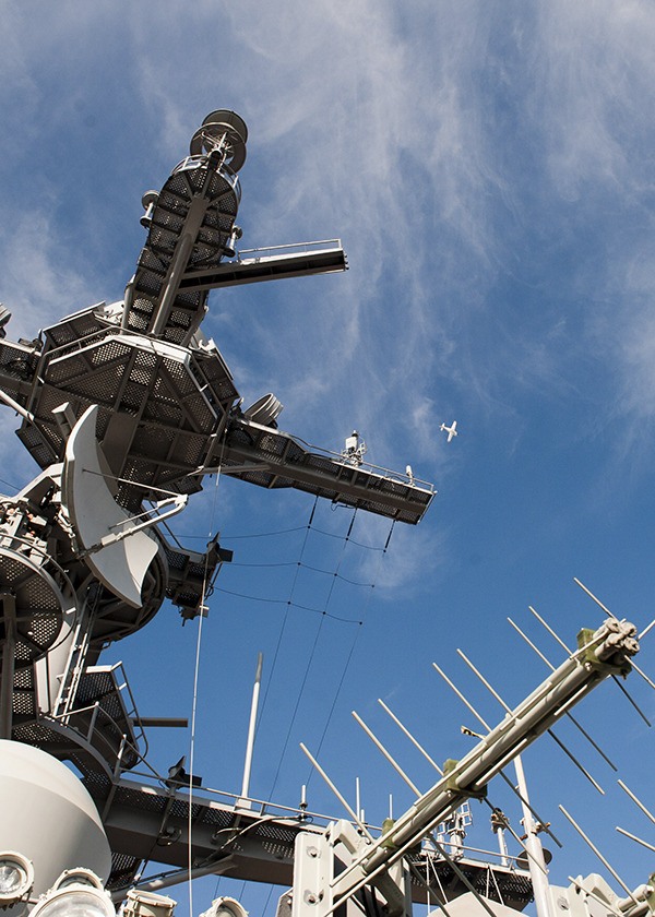 Nimitz-class aircraft carrier USS John C. Stennis (CVN 74) conducts pier-side alignments and testing of combat systems equipment. These alignments require use of high and low power radars and nearly 20 overflights of the ship by a contracted aircraft at a flyover altitude of a minimum of 1