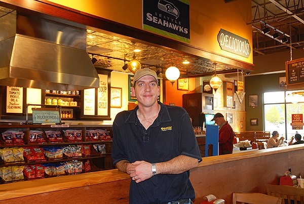 Potbelly Sandwich Shop General Manager Mike Young stands in the new restaurant in Kitsap Mall Sept. 14.