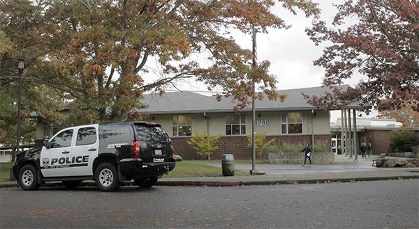 Poulsbo police remained on the North Kitsap High School campus Oct. 29 after a student was arrested the previous night for allegedly plotting to harm other students.