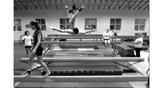 NKHS gymnast practices a beam routine at the Zero Gravity Gymnastics facility. The new gym was custom built to house the teams for Kingston and North Kitsap High Schools as well as the teams and groups of ZGA.