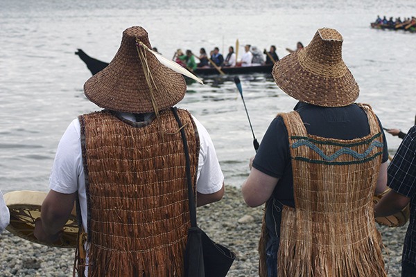 Canoes arrive at Suquamish during the 2011 Canoe Journey.