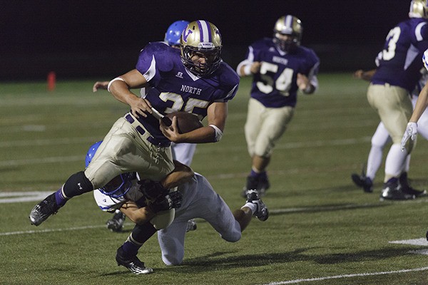 North Kitsap running back Kyle North breaks a tackle during the Sept. 5 game against the Bainbridge Spartans. Since then
