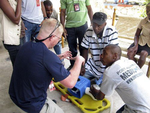 Two Poulsbo firefighter/paramedics are assisting the recovery effort in Haiti.