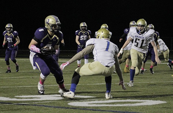 North Kitsap tight end Kole Milyard fakes out a Bremerton defender