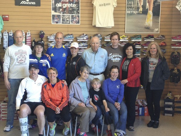 Local runners gather at Poulsbo Running on 10th Avenue April 16 to show their support and solidarity with the marathoners in Boston.