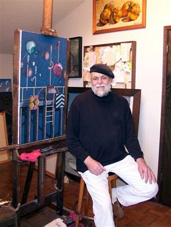 Seabeck artist Brad Kauzlaric is shown in his studio in 2004.