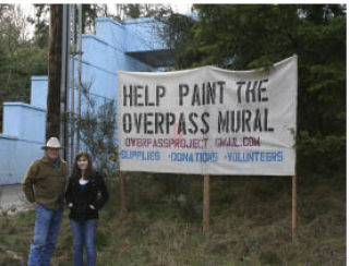 Tex Lewis and Laura Fedorko are recruiting volunteers and asking for donations to help paint a mural on the Anderson Hill overpass in Silverdale. Painting could begin as early as April. Not pictured: Victoria Cartwright who also is working on the project.
