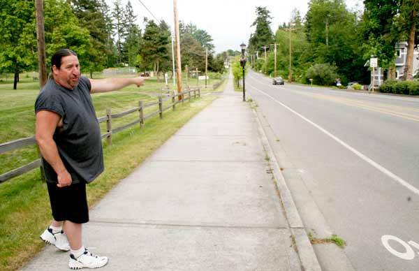 Kingston resident Wade Smith points out a speeding driver on West Kingston Road. Wade raised his concerns over speeders in May to the Kingston Citizens Advisory Council.