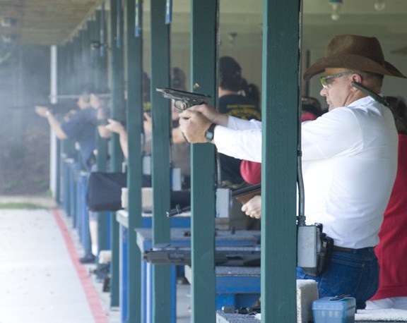 Embattled gun club celebrates national independence with 'liberty volley'